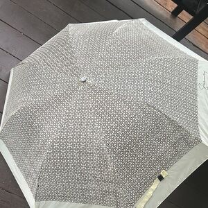 Brown and cream color umbrella